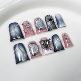 RIICFDD duck press-on nails in blue-white gradient with rhinestone heart embellishment
