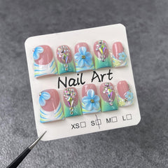 RIICFDD light-green French nails with blue 3D flower art for elegant quick application.
