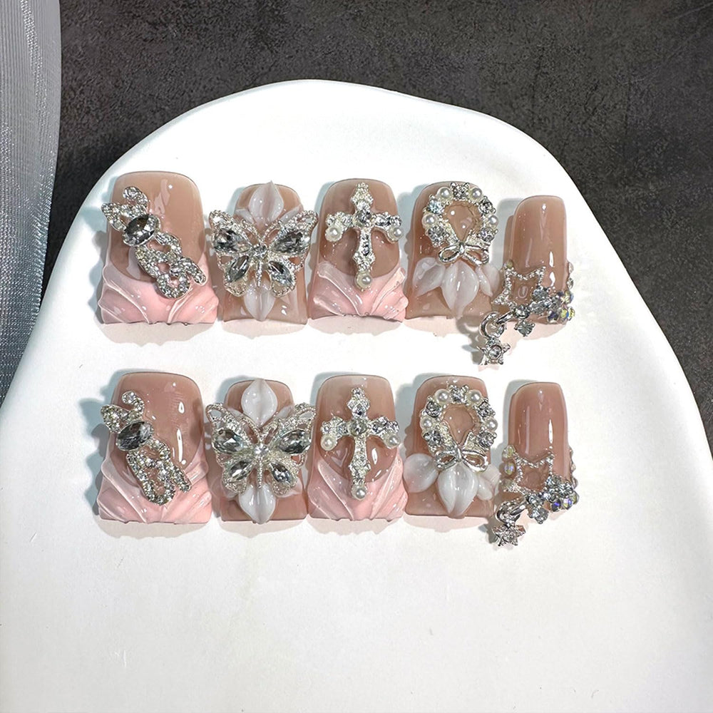 RIICFDD luxury duck press-on nails with butterfly rhinestones for a salon-quality look