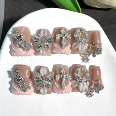 RIICFDD glittery French tip nails in a glossy finish for sparkling everyday wear