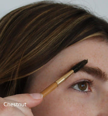 Close-up of River Organics Chestnut Brow Wax delivering natural, buildable hold.
