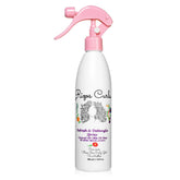 Rizos Curls Refresh & Detangle Spray bottle pours for easy detangling and refreshed curls.
