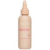 Rizos Curls travel ACV rinse bottle pour promotes balanced scalp moisture and shine.