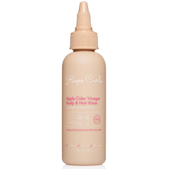 Rizos Curls travel ACV rinse bottle pour promotes balanced scalp moisture and shine.