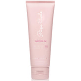 Rizos Curls Travel Light Hold Gel bottle delivers weightless definition and frizz control.