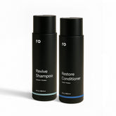 Ro Men's Revive Shampoo bottle displaying exfoliating scalp care for a fuller look