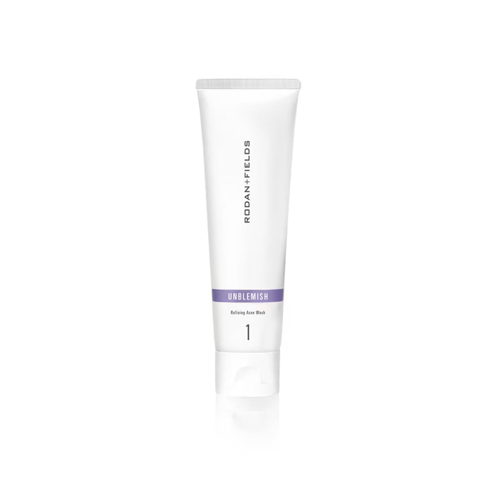 RODAN + FIELDS Unblemish Face Wash bottle pour demonstrates gentle cleansing and oil control.