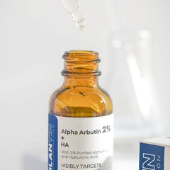 ROLANYIN Alpha Arbutin Serum dispenser demonstrates precise application for even skin tone.