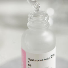 ROLANYIN serum applied to cheek showing lightweight non greasy finish