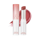 Rom&nd Glasting Melting Balm packaging close-up showing premium gloss and hydration.
