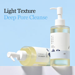 ROUND LAB 1025 Dokdo Cleansing Oil on face showing lightweight texture for sensitive skin.