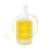 S.NATURE Jojoba Oil 30ml bottle close-up for facial, hair, and body nourishment.
