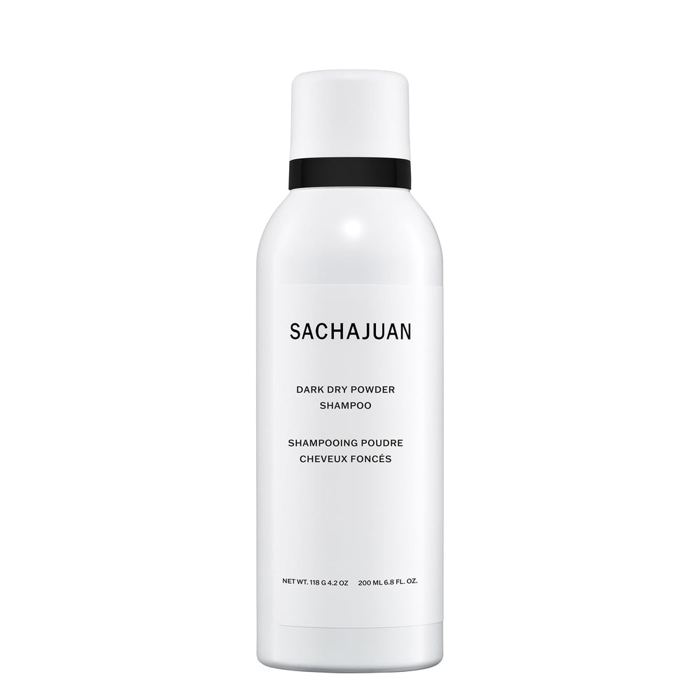 SACHAJUAN Dark Dry Powder Shampoo being sprayed on dry roots for quick refresh.