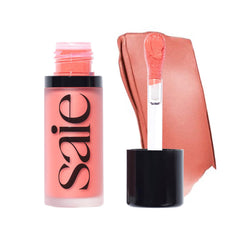 Saie Dew Liquid Blush with chubby doe-foot wand for precise application.