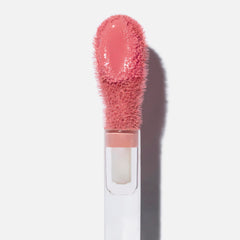 Creamy texture of Saie Dew Liquid Blush blends seamlessly into skin.