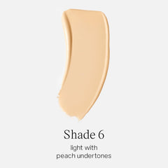 Saie Glowy Super Skin Tint Shade 6 swatch shows peach undertones for light skin.