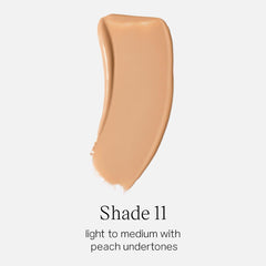 Saie Glowy Super Skin Tint shake-before-application demonstrates skincare-serum activation