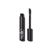 Saie Mascara 101 wand at base of lashes showing lengthening