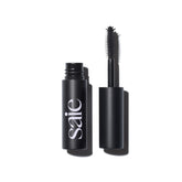 Saie Mini Mascara 101 wand in action for lengthened, lifted lashes.