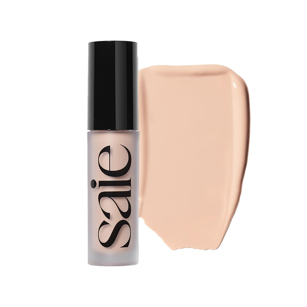 Saie Slip Tint bottle close-up showing radiant finish and lightweight texture.