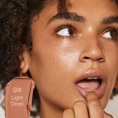 Swatch of Saie Slip Tint Six reveals natural glow and even tone.