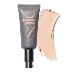 Saie Slip Tint Two bottle closeup shows dewy finish and SPF 35 protection.