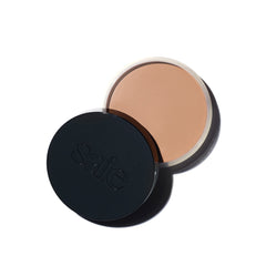 Saie Sun Melt bronzer compact close-up showing creamy texture for effortless blend.