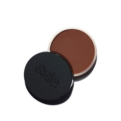 Saie Sun Melt Deep Bronze swirl on cheek for a natural glow