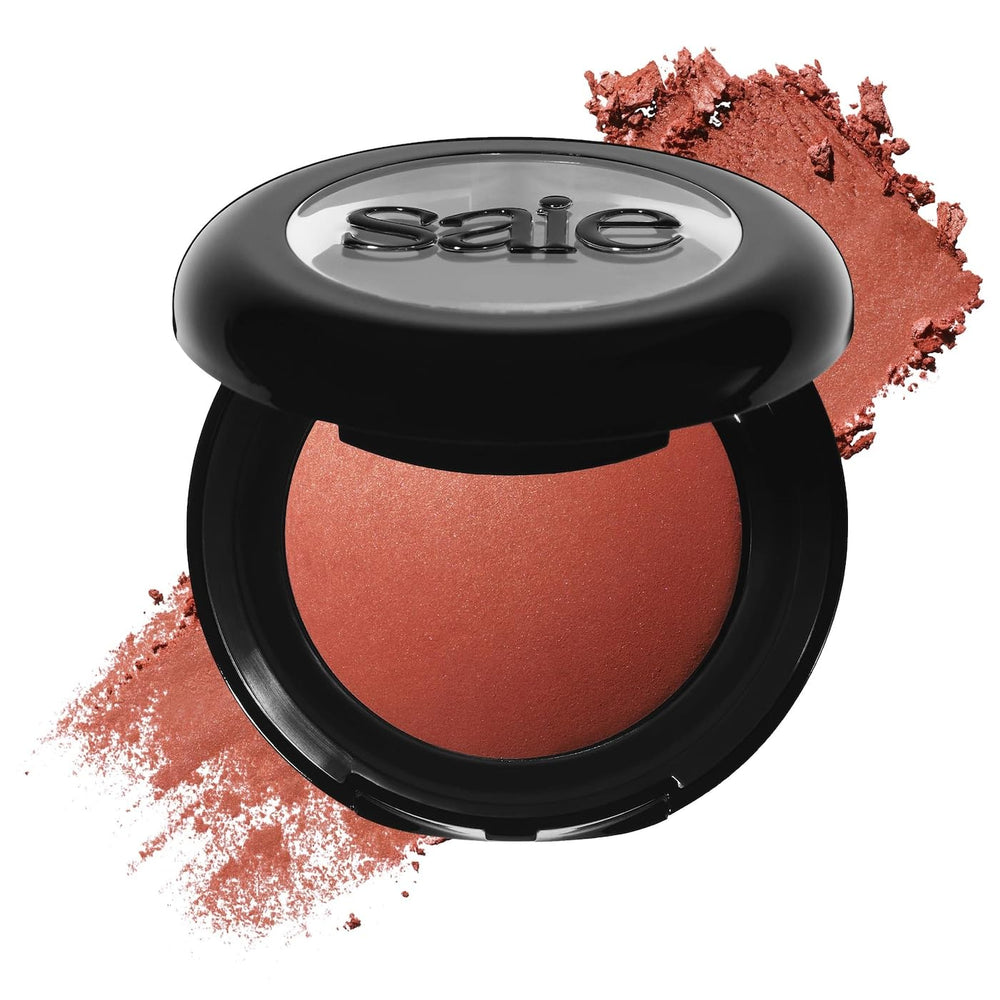 Saie SuperSuede blush close-up highlights luxurious baked texture for a soft, diffused flush.