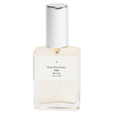 Saint Rita Parlor Rita's Parfum bottle close-up highlighting vanilla musk and leather notes.