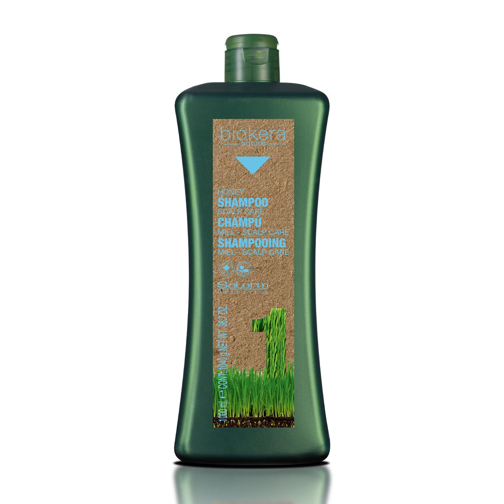 SALERM Biokera Natura Honey Scalp Care Shampoo bottle pouring for gentle cleansing