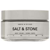 Salt & Stone Santal & Vetiver body cream bottle showing deep hydration benefits.