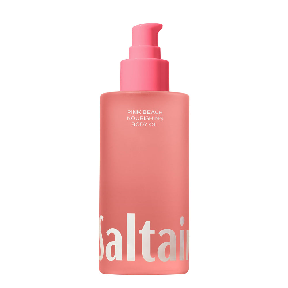 Saltair Body Oil Pink Beach bottle with luxurious hydration for soft, moisturized skin after shower.