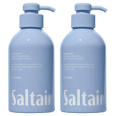 Saltair Seascape bottle pump held in hand for easy, moisturizing cleanse.