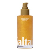 Saltair Shimmering Body Oil with Golden Hour fragrance, easy pump for radiant hydration.