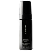 SALTYFACE Tanning Foam bottle demonstrates easy, streak-free application for a sun-kissed glow.