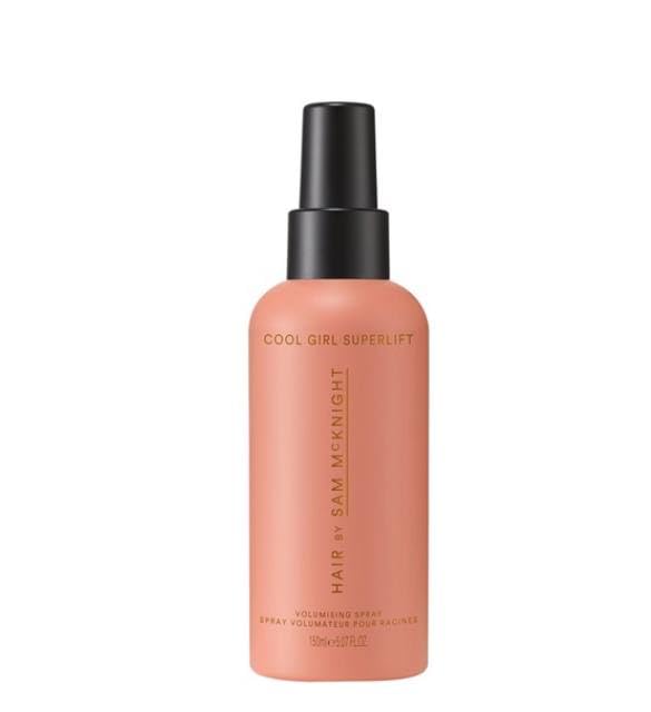 SAM MCKNIGHT Hair Cool Girl Superlift bottle demonstrates root lift for voluminous styling.