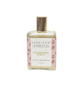 Sand + Fog Strawberry Spritz bottle with strawberry motif, refreshing, lasting aroma.