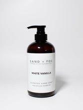 Sand + Fog White Vanilla hand soap bottle with creamy lather for nourished hands.