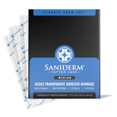 Saniderm Original gloss bandage on tattooed skin for clean, protected healing.