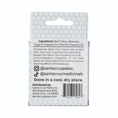 Santa Cruz Paleo lip balm stick close-up shows smooth texture for lasting moisture.