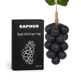 SAPHUS grape-shaped soap bar closeup showing handcrafted detail and creamy lather.