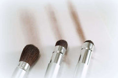 Saving Grace Hair Powder Black swatches demonstrate blendable shade for a natural look
