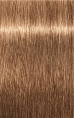 Schwarzkopf IGORA ROYAL 8-65 applicator close-up for precise color application.