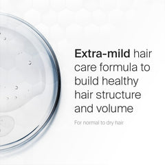 SEBAMED Everyday Shampoo ingredients-closeup pointing to nourishing components for hair structure