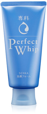 Senka Perfect Whip bottle close-up with creamy foam texture for daily cleansing.