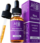 SeoulCeuticals Rice Bran Oil bottle on a glass surface for glass skin glow.