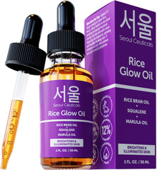 SeoulCeuticals Rice Bran Oil bottle on a glass surface for glass skin glow.