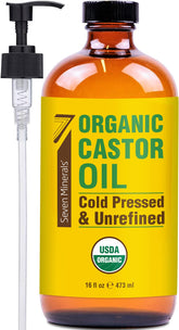 Seven Minerals castor oil in amber glass bottle supports pure skin and hair care.
