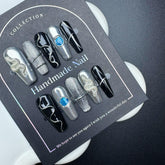 Sevgob 5D embossed nails with snake charms for quick at-home nail art.